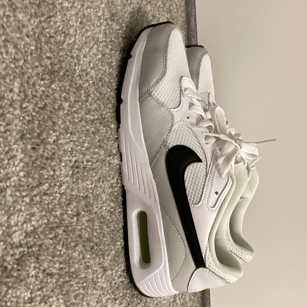 the shoes are nike air maxs no box white and yellow,black.